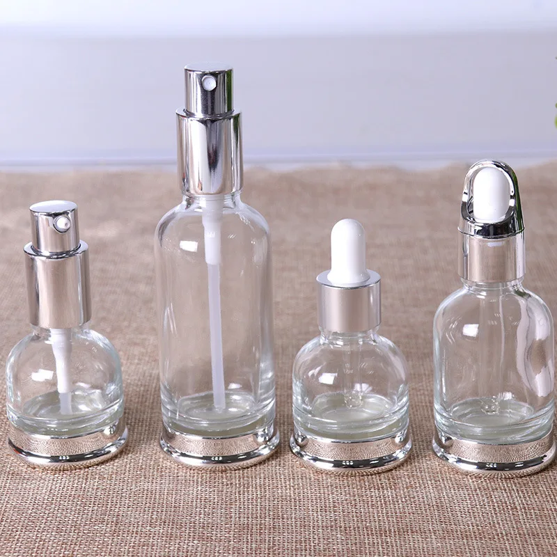 Празни флакони от етерични масла за многократна употреба Флакон-спрей за парфюми Контейнери за лосион за грижа за кожата Малката Висококачествена стъклена бутилка-помпа Изображение 0