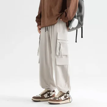 Мъжки демисезонная однотонная дрехи с висока талия, джобове дантела прозорци и еластична цип за ежедневието си на свободни широки панталони, пури в ограничени бройки панталони