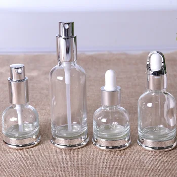 Празни флакони от етерични масла за многократна употреба Флакон-спрей за парфюми Контейнери за лосион за грижа за кожата Малката Висококачествена стъклена бутилка-помпа